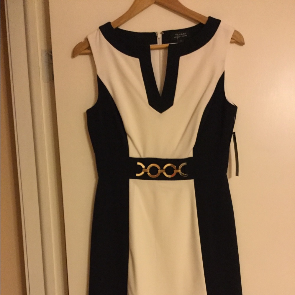 Tahari dress is n white and navy blue